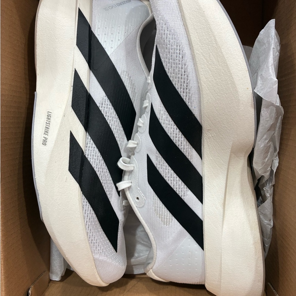 Adidas Unisex Athletic Shoes in White and Black
